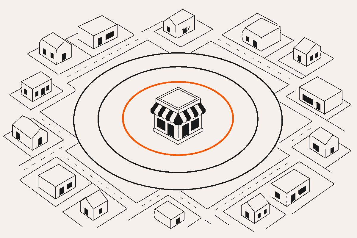 Abstract storefront at the center of a neighborhood street grid with an orange reach ring expanding around it